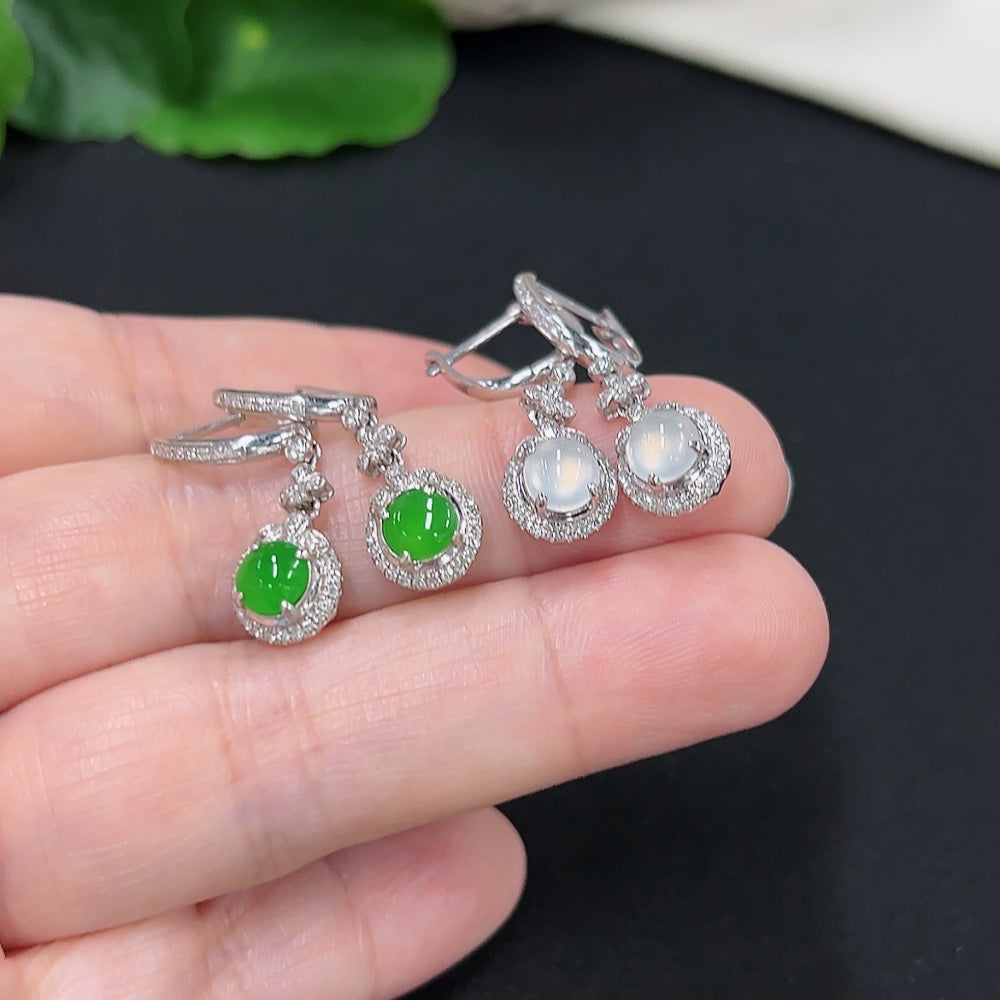 Jadeite inlaid earrings with 18K gold and diamond accents, featuring intricate craftsmanship and elegant design by HKHQ.