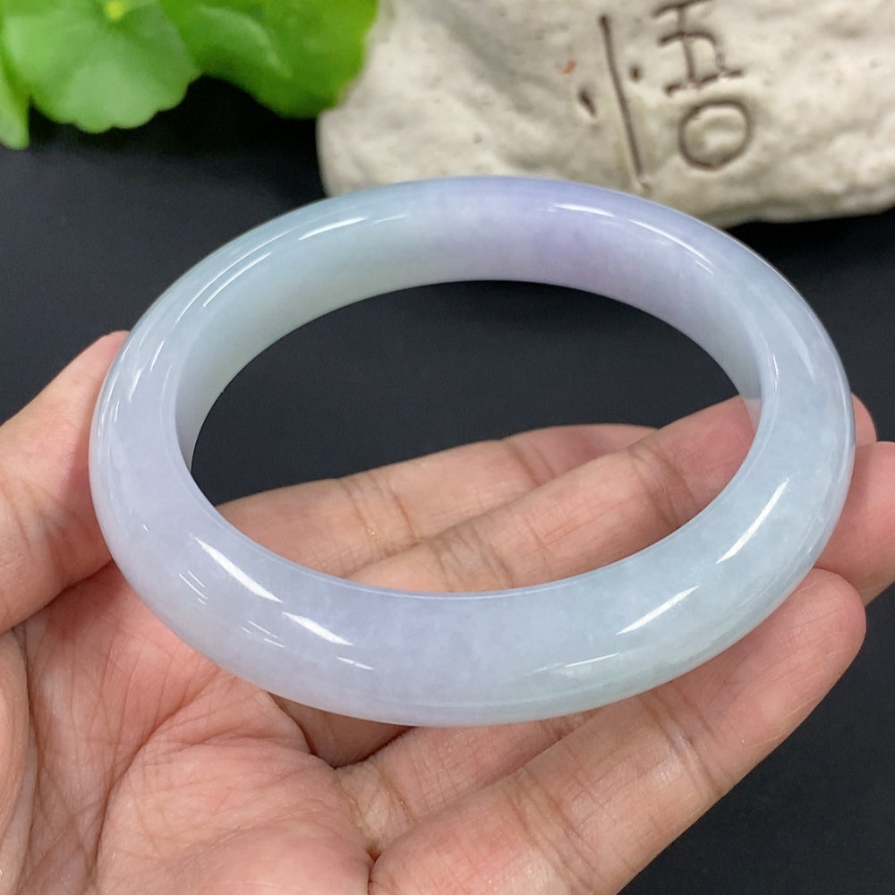 HKHQ jadeite round bangle, 67.3g, size 58.7, showcasing smooth, polished jadeite bracelet with a glossy finish.
