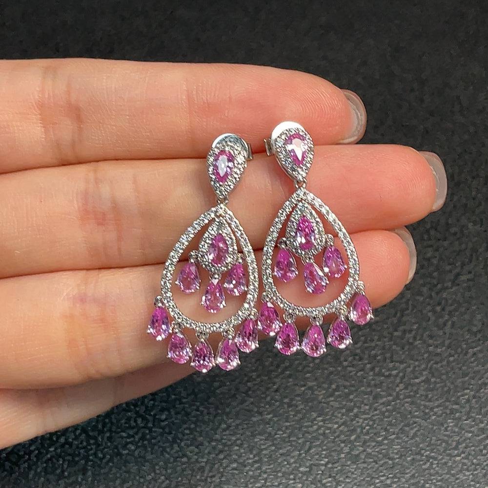 Huiliu Certified Blue Sapphire Earrings featuring vibrant gemstone studs in a sleek design, perfect for elegant jewelry.