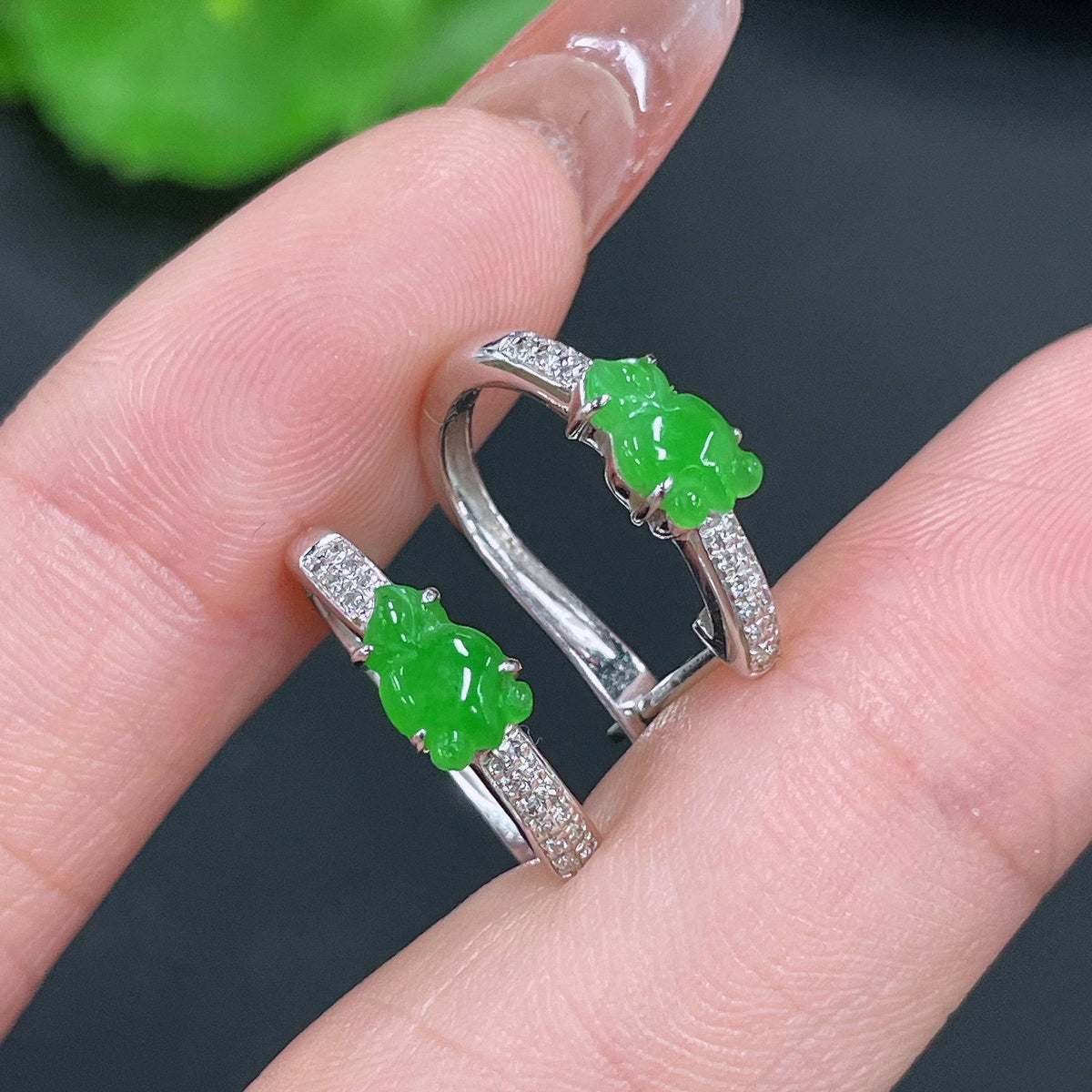 HUILIU HQ jadeite earrings set in 18k gold with diamond accents, featuring a smooth, polished jade surface and elegant design.