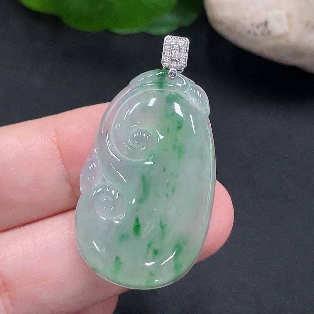 Jadeite Ruyi pendant with 18K gold and diamond accents, crafted by HUILIU HQ, showing intricate design and polished surface.
