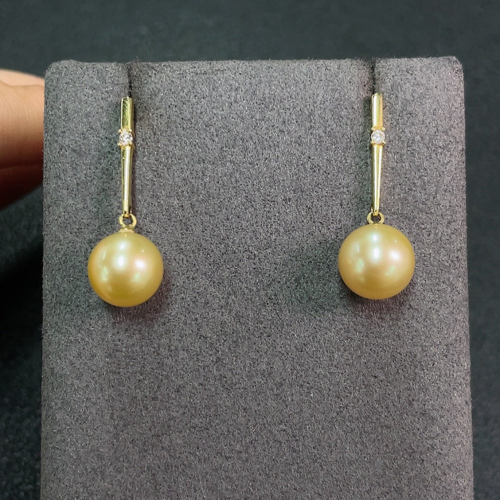 Seawater Pearl Earrings Set in 18K Gold, Approx. 9.2mm, Total Weight About 3.60g, Color Origin Undetermined, Accented with Diamonds