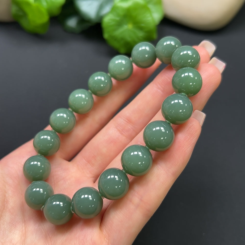 Hetian Jade bracelet by HKHQ featuring smooth, polished jade stones and a 45g weight, stylish and elegant jewelry accessory.