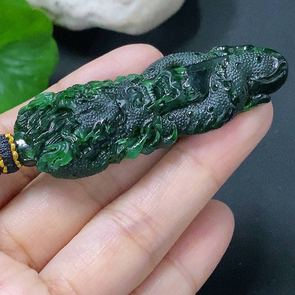 Huiliu Jadeite pendant featuring a dragon plaque with rope, showcasing detailed carved jade with vibrant green color.