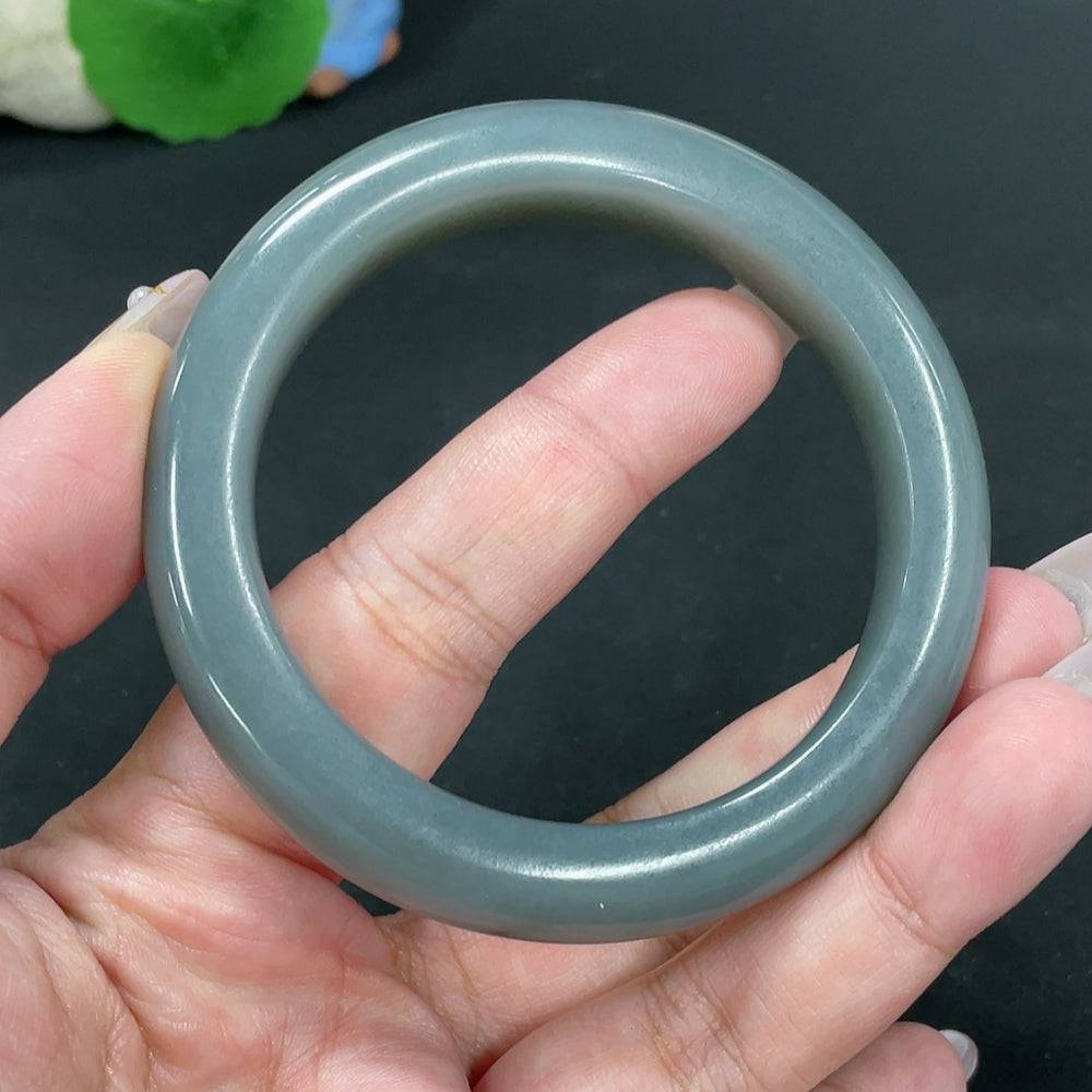 Huiliu certified Hetian jade round bracelet featuring smooth, polished jade beads on a delicate string.