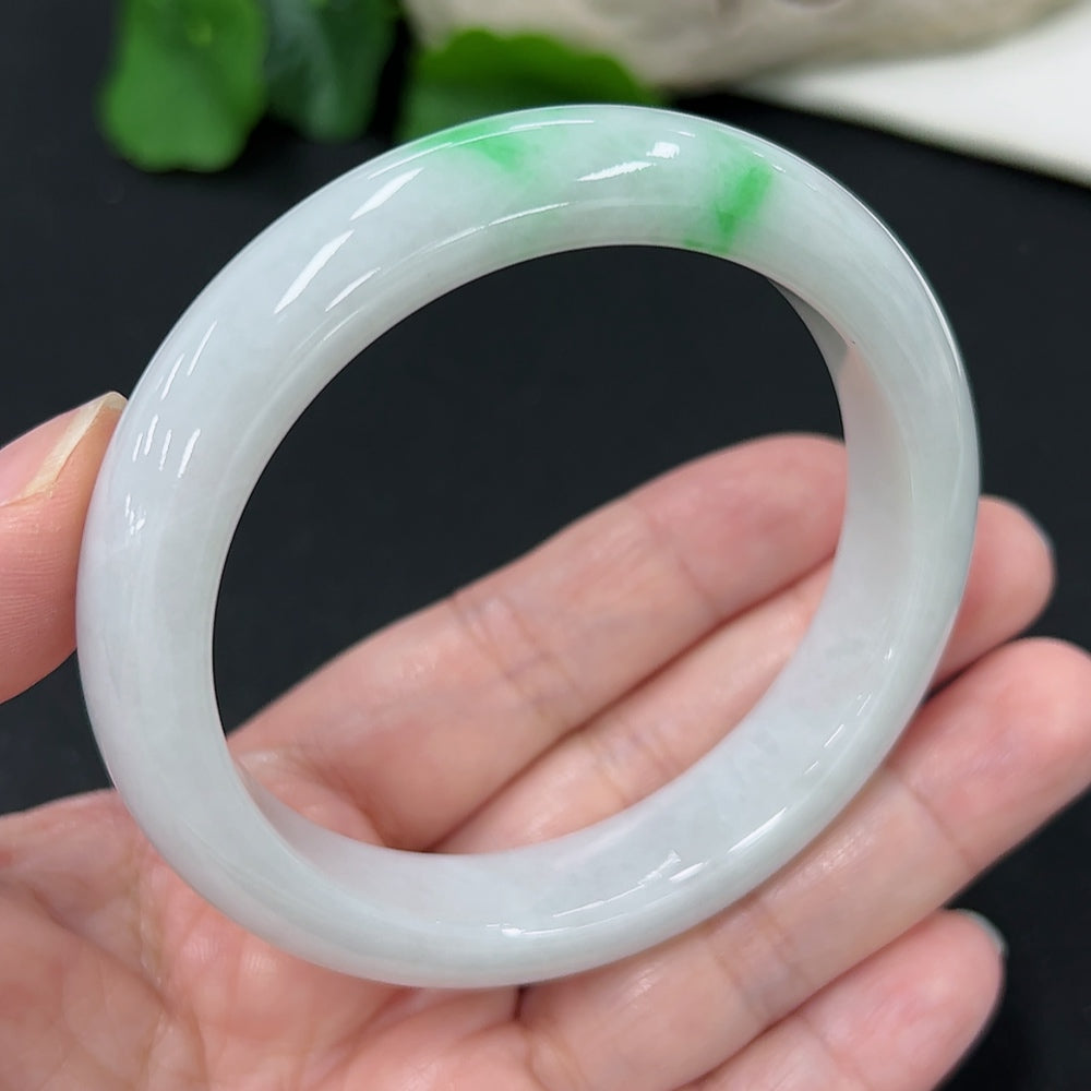 HKHQ jadeite round bangle, size 57.4, weighing 60.67g, showcasing smooth, polished jadeite bracelet with elegant round shape.