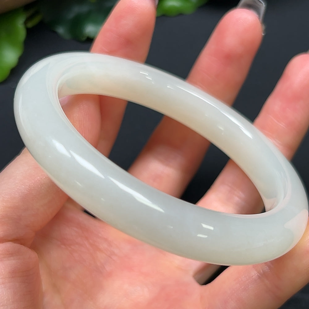 Hetian jade round bracelet with 58.9mm diameter, weighing approximately 54.15g, crafted by HKHQ, showcasing smooth, polished jade beads.