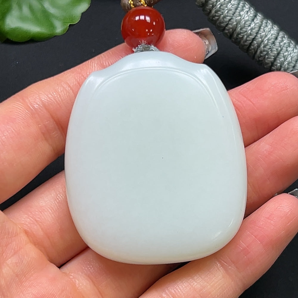 HKHQ Hetian Jade plain pendant with rope necklace, 61.16g, showcasing smooth jade and elegant design.