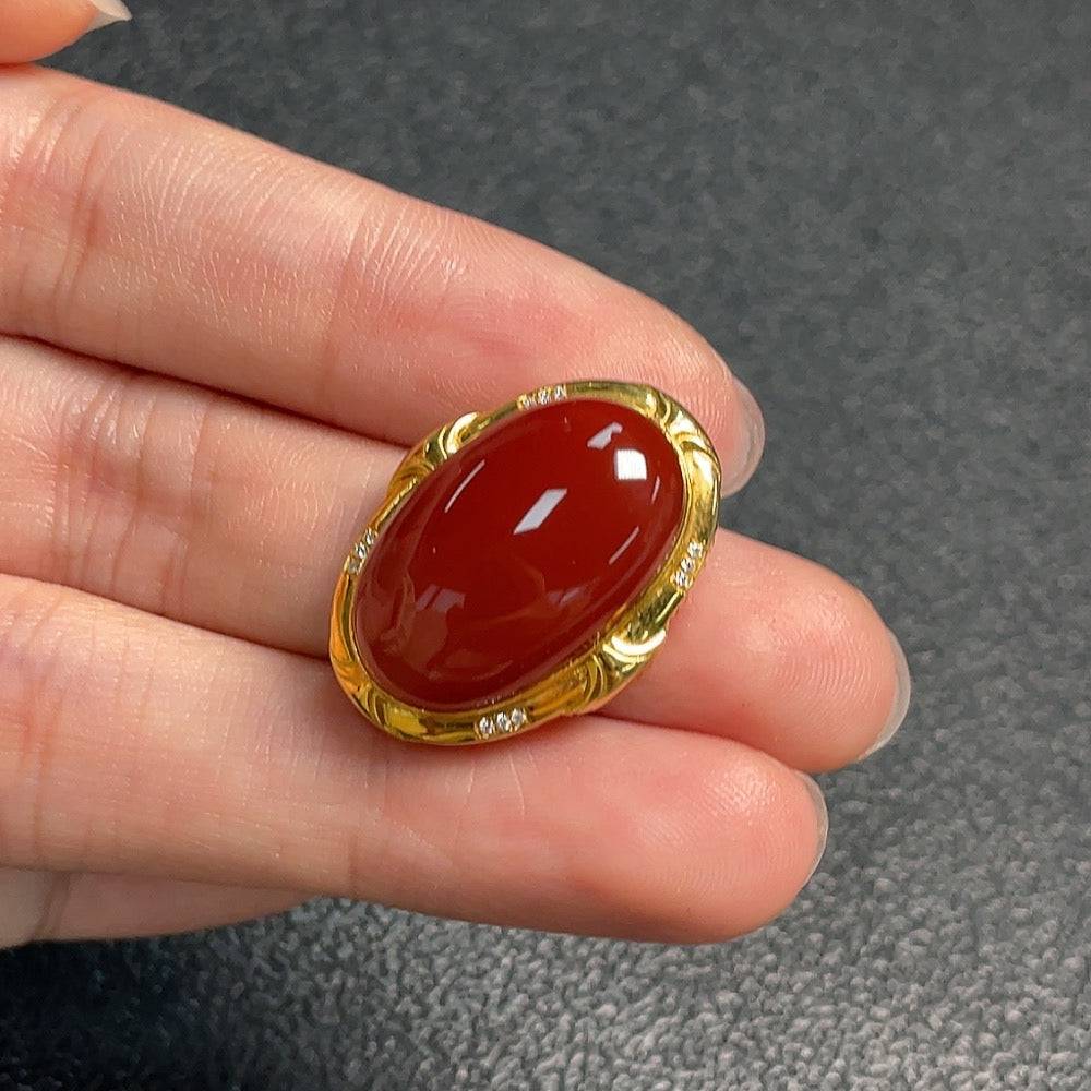 Red Agate gemstone jewelry by HUILIU HQ featuring polished, vibrant red agate stones with a smooth finish.