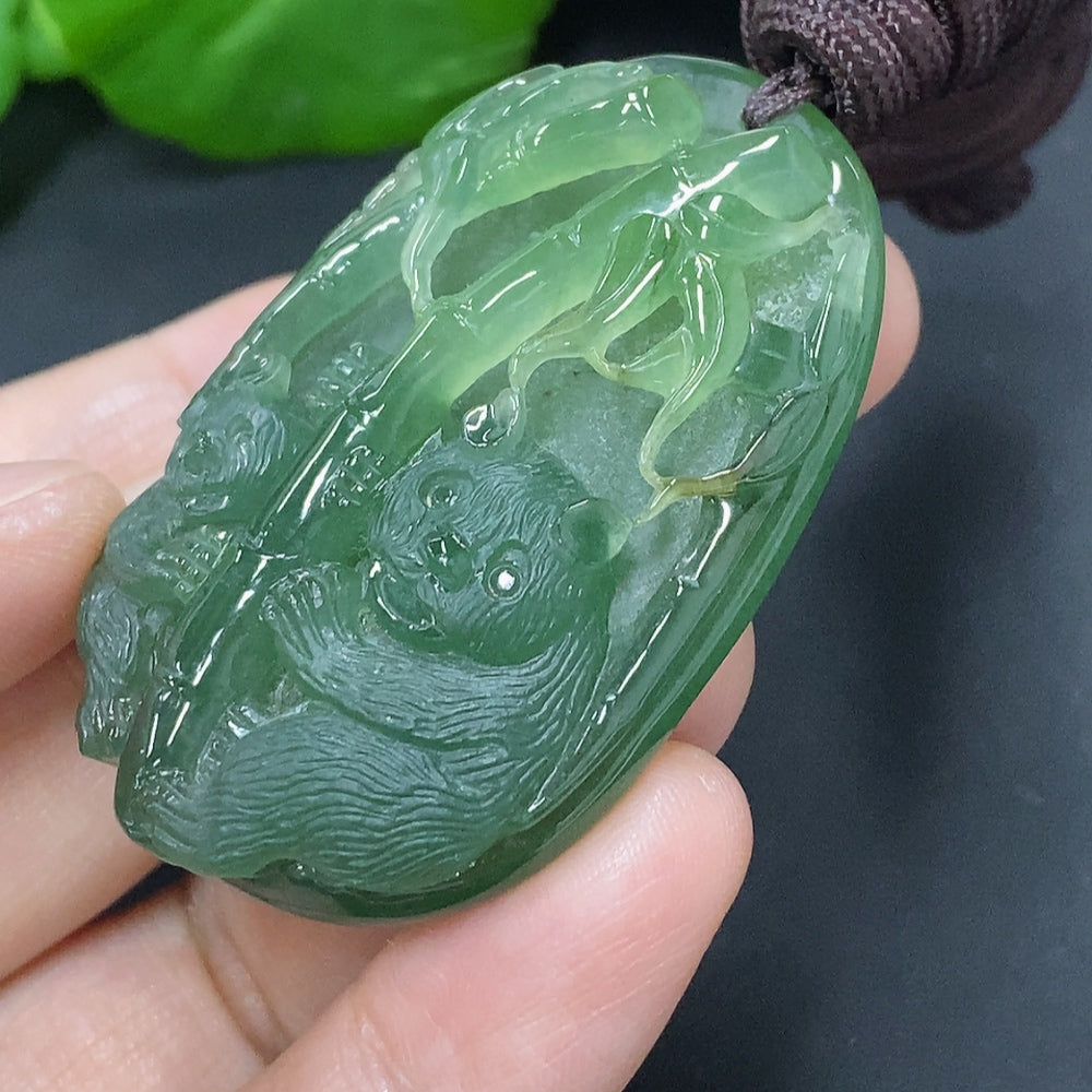 Jadeite pendant shaped like a little bear, weighing approximately 36.29g, with a rope chain, from HKHQ.