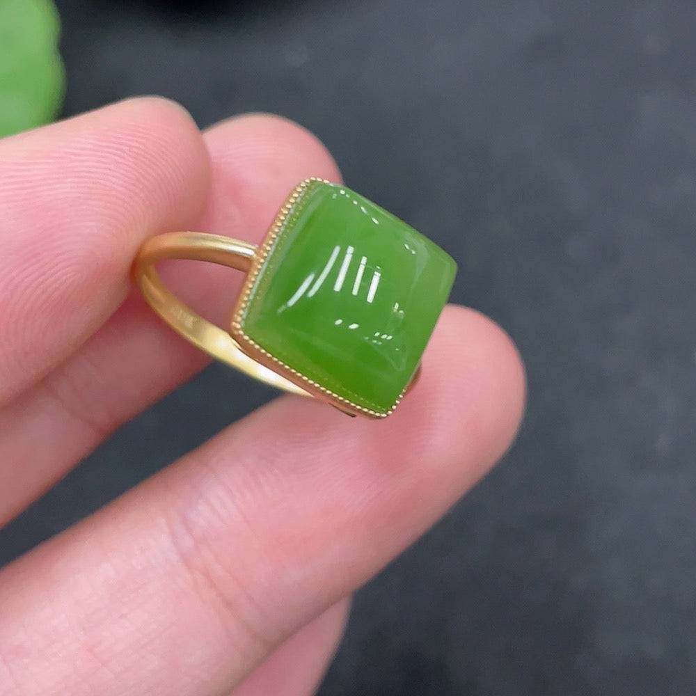 Huiliu certified Hetian Jade inlaid ring featuring smooth polished jade stone and intricate metalwork design.