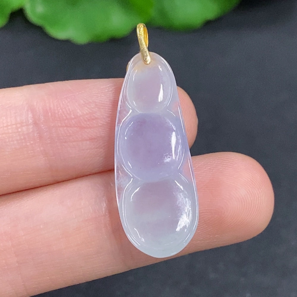 Jadeite lucky bean pendant with 18k gold clasp, crafted from green jade, weighing approximately 3 grams.
