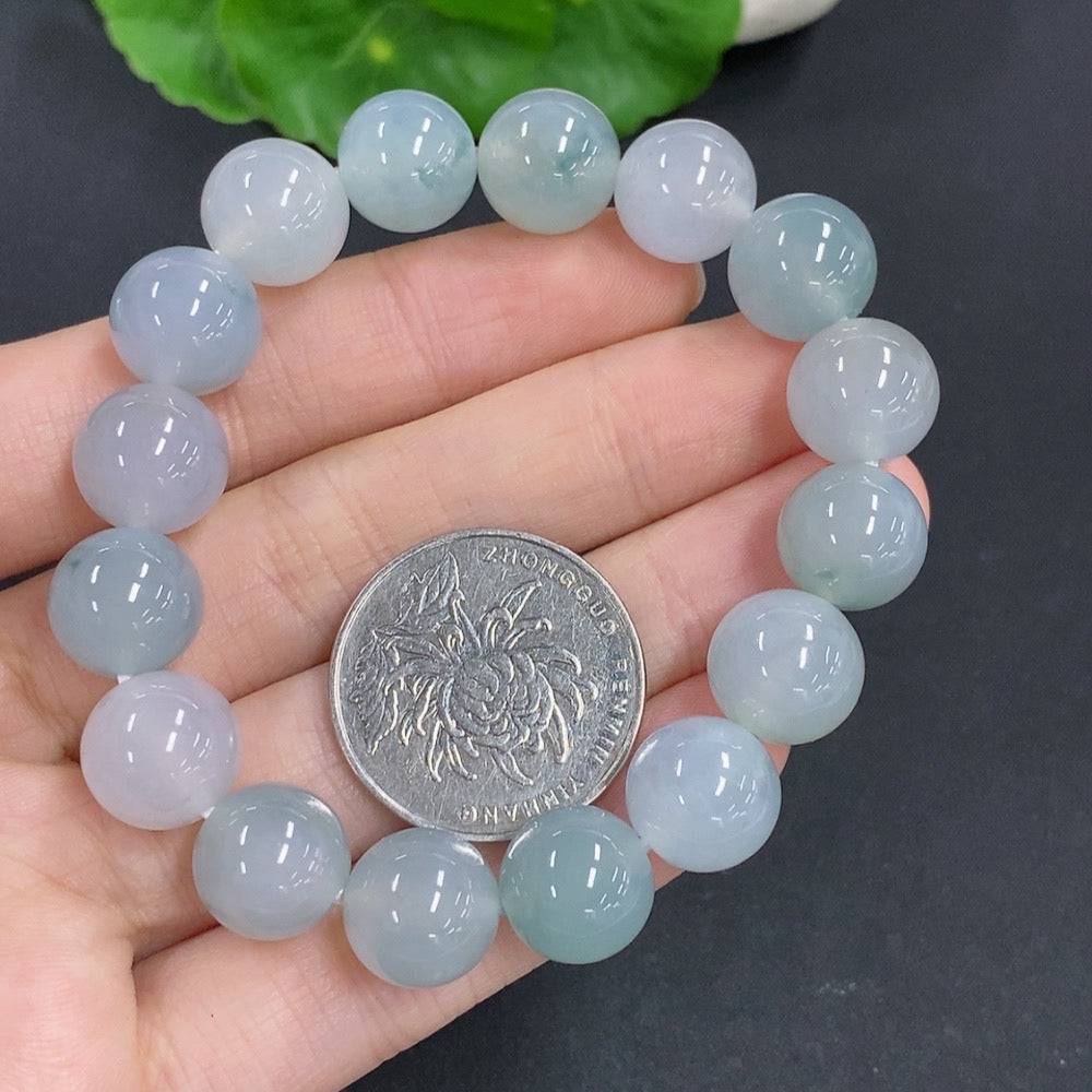 HUILIU HQ jadeite bracelet with 44.7g weight and 11.7mm width, showcasing smooth, polished green jade stones.