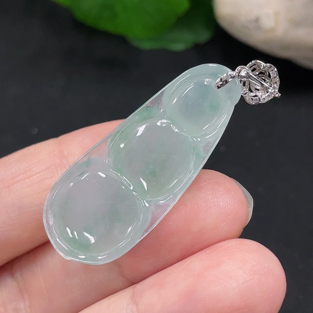 Jadeite lucky bean pendant with diamond accents, 18K gold, from HUILIU HQ, showing the detailed jade and gold craftsmanship.