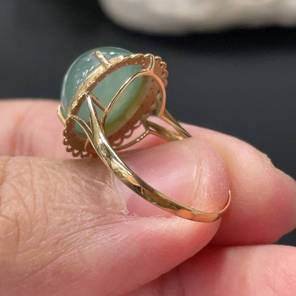Huiliu Jadeite cabochon ring setting with diamond accents, showcasing polished green jade and sparkling diamond details.