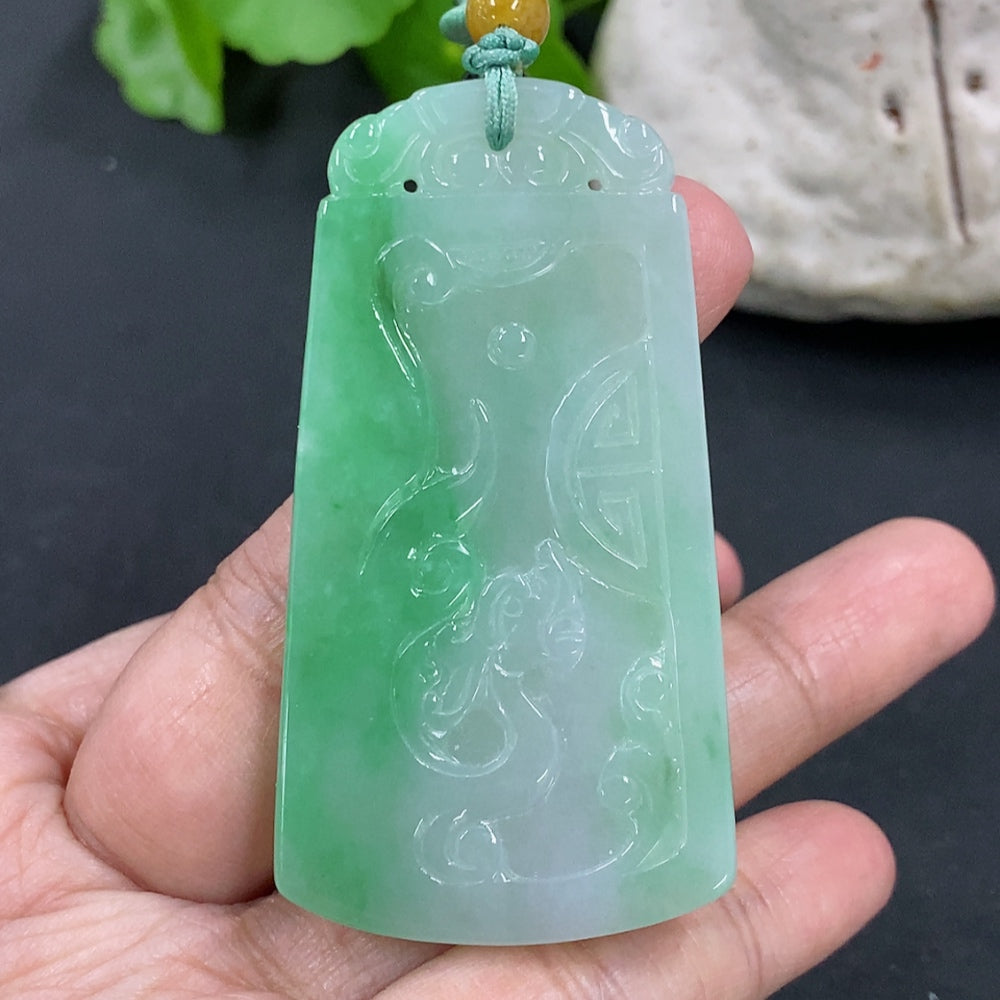 Antique jadeite pendant on necklace, featuring a polished green jadeite stone, weighs approximately 32g, by HKHQ.