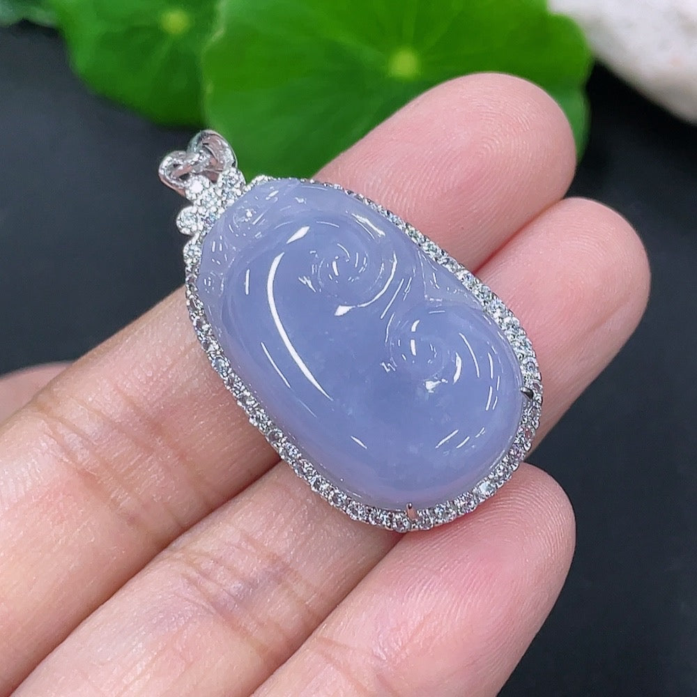 Jadeite inlaid Ruyi pendant by HKHQ, non-gold with intricate jade design, weighs approximately 6.37 grams.