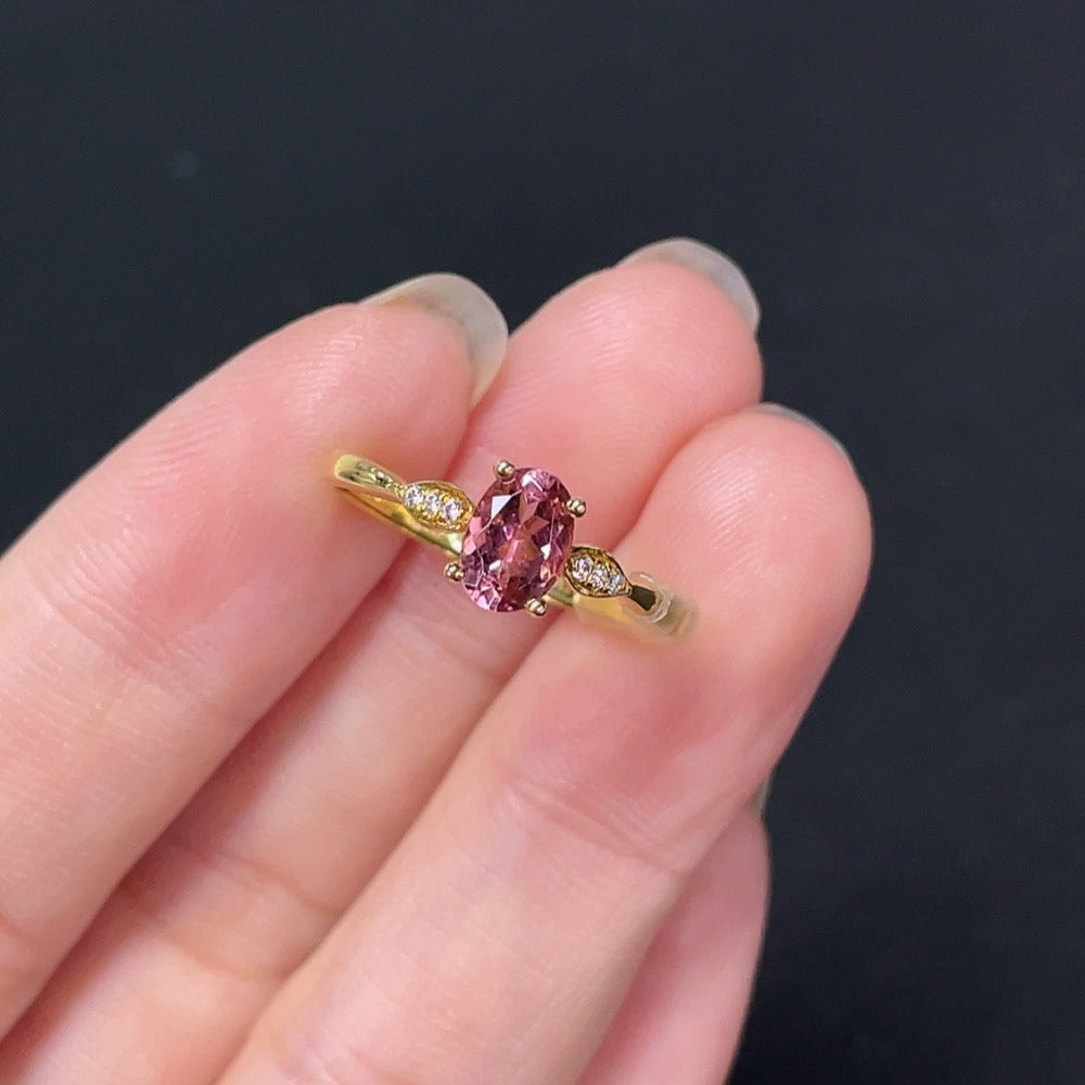 HKHQ tourmaline ring with non-diamond gemstones in 18K gold, showcasing a detailed close-up of the elegant jewelry design.