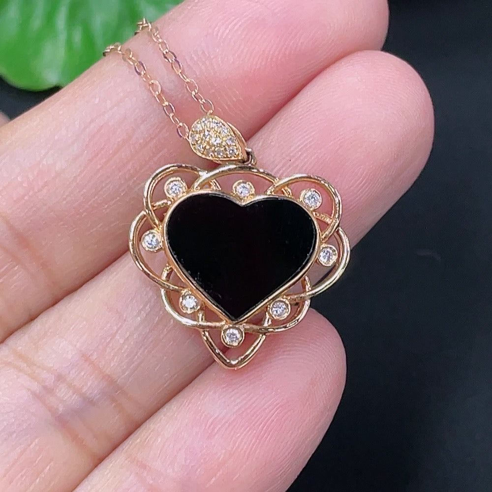 Jadeite heart-shaped pendant with 18k gold and diamond accents