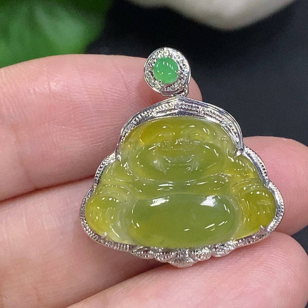 Jadeite Buddha pendant in 18K gold with diamond accents, weighing approximately 2.7g, featuring detailed Buddha carving.