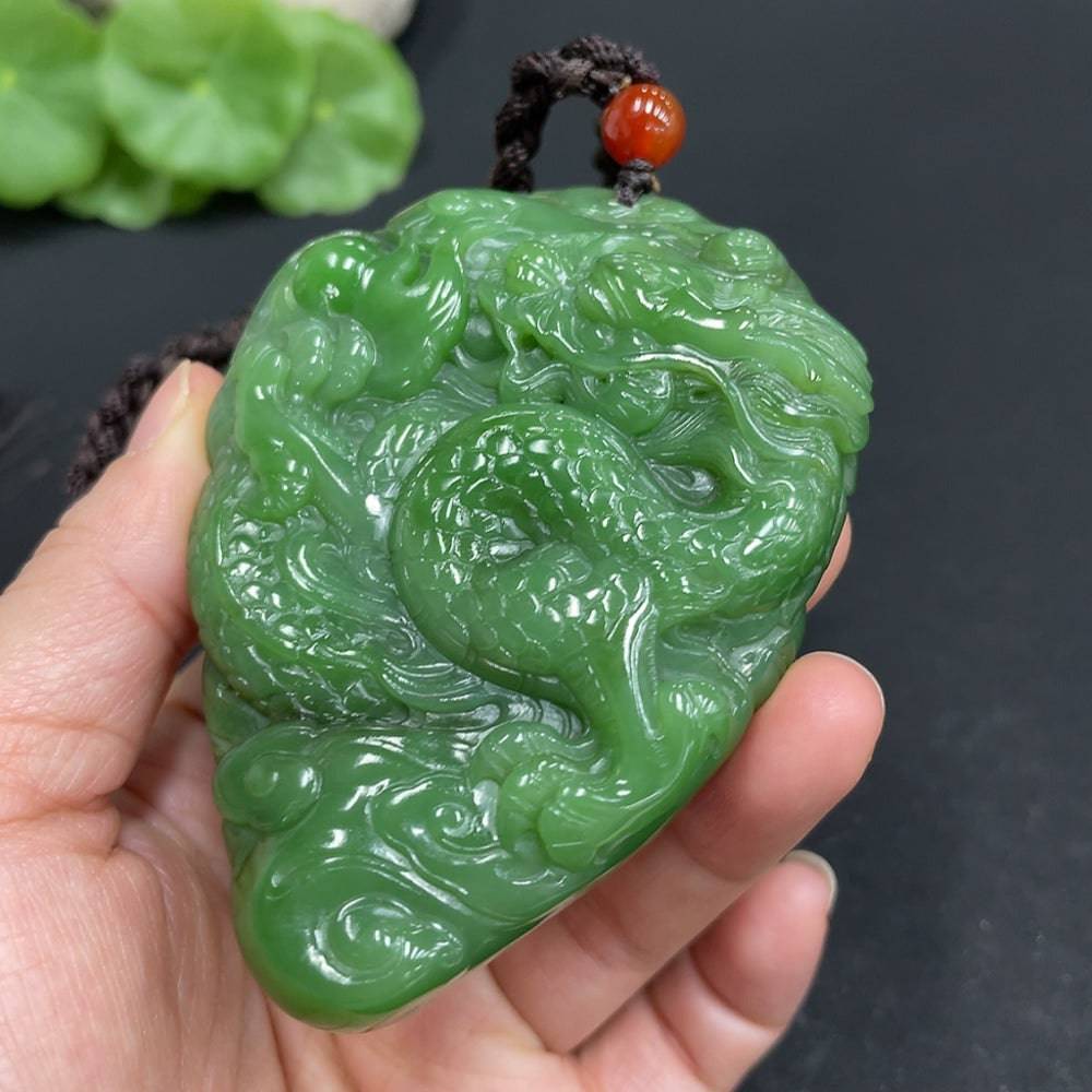 Huiliu HQ Hetian Jade hand-carved dragon figurine, intricate jade sculpture with detailed dragon design for collection or display.