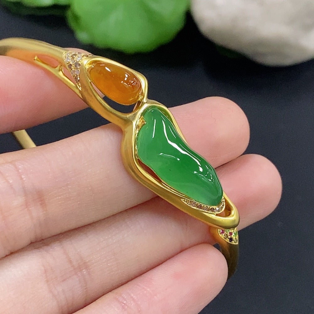 Jadeite inlaid 18k bangle with diamond accents, featuring green jade and intricate design, size 58.1/48.9, weight 16.22g