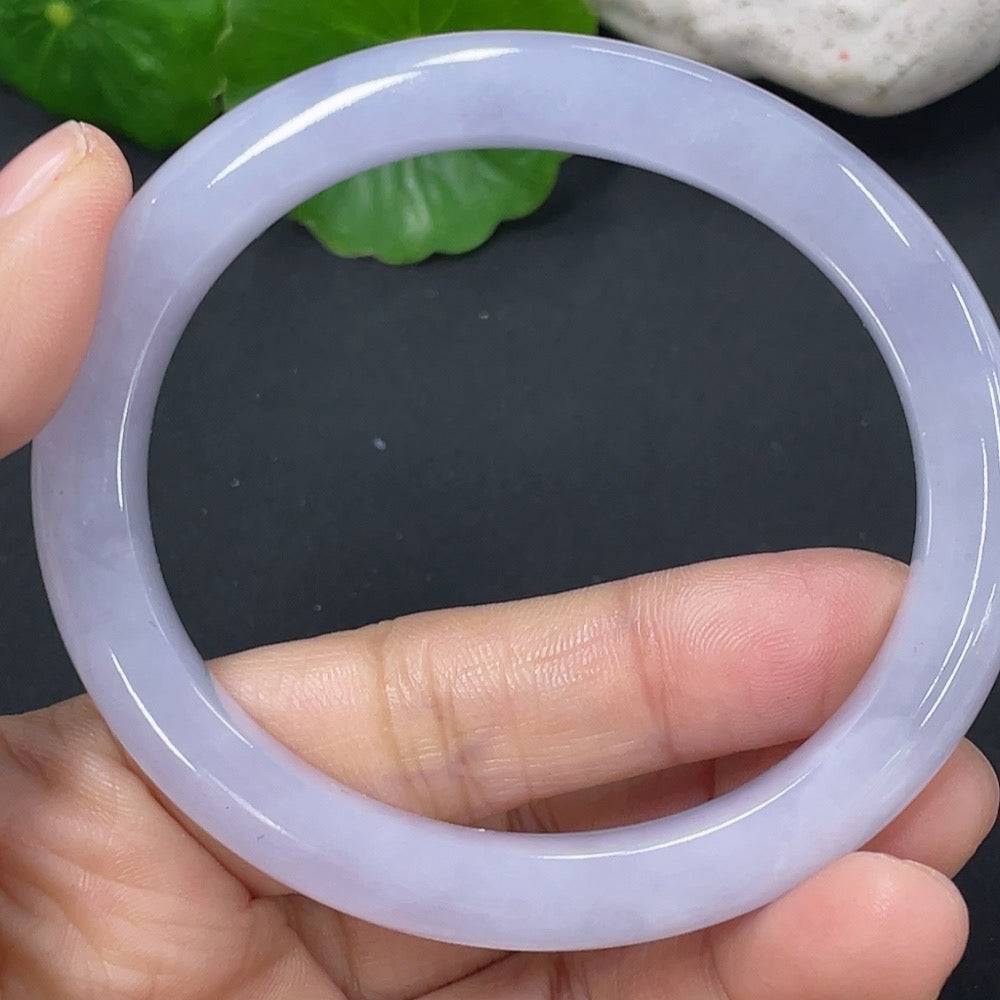 HUILIU HQ jadeite concubine bracelet with carved design, size 54.2/48.2mm, weighing approximately 36.28g, showcasing smooth jade surface.