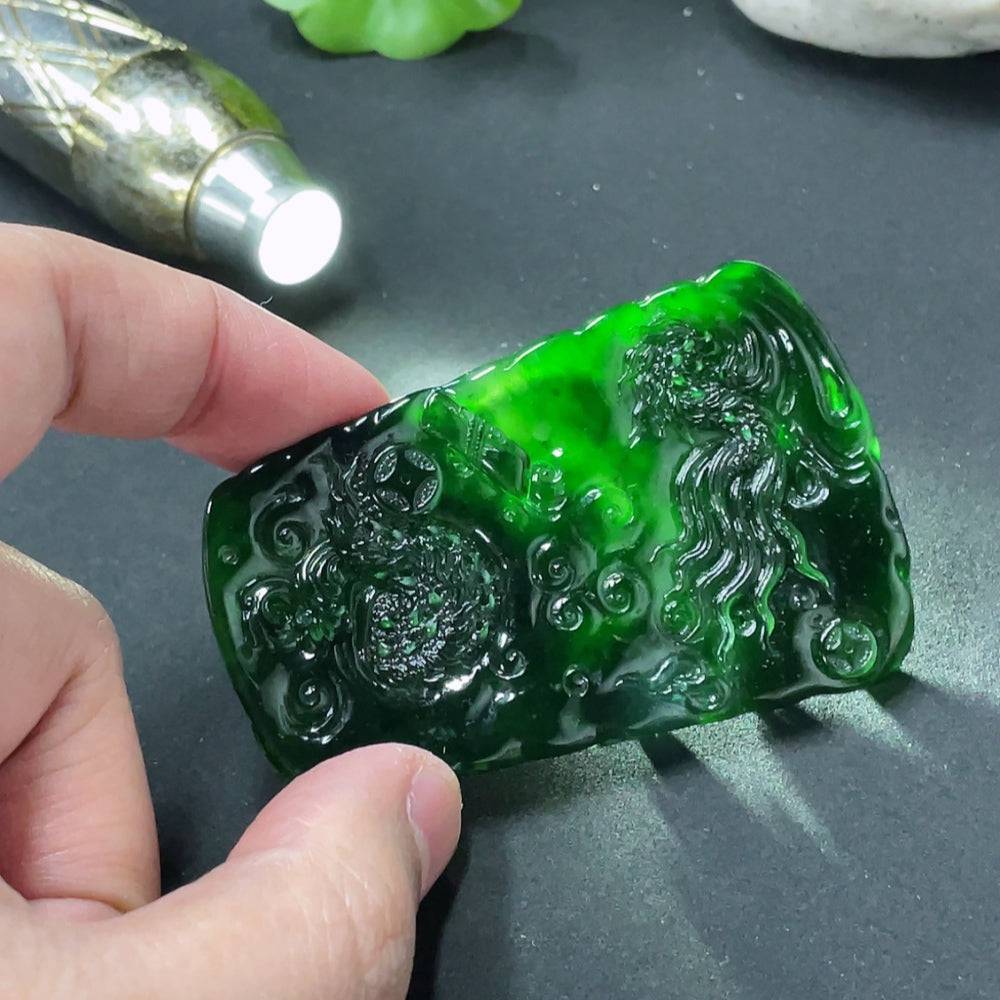 Jadeite dragon pendant weighing approximately 40g, crafted from green jade, featuring intricate dragon design by HUILIU HQ.