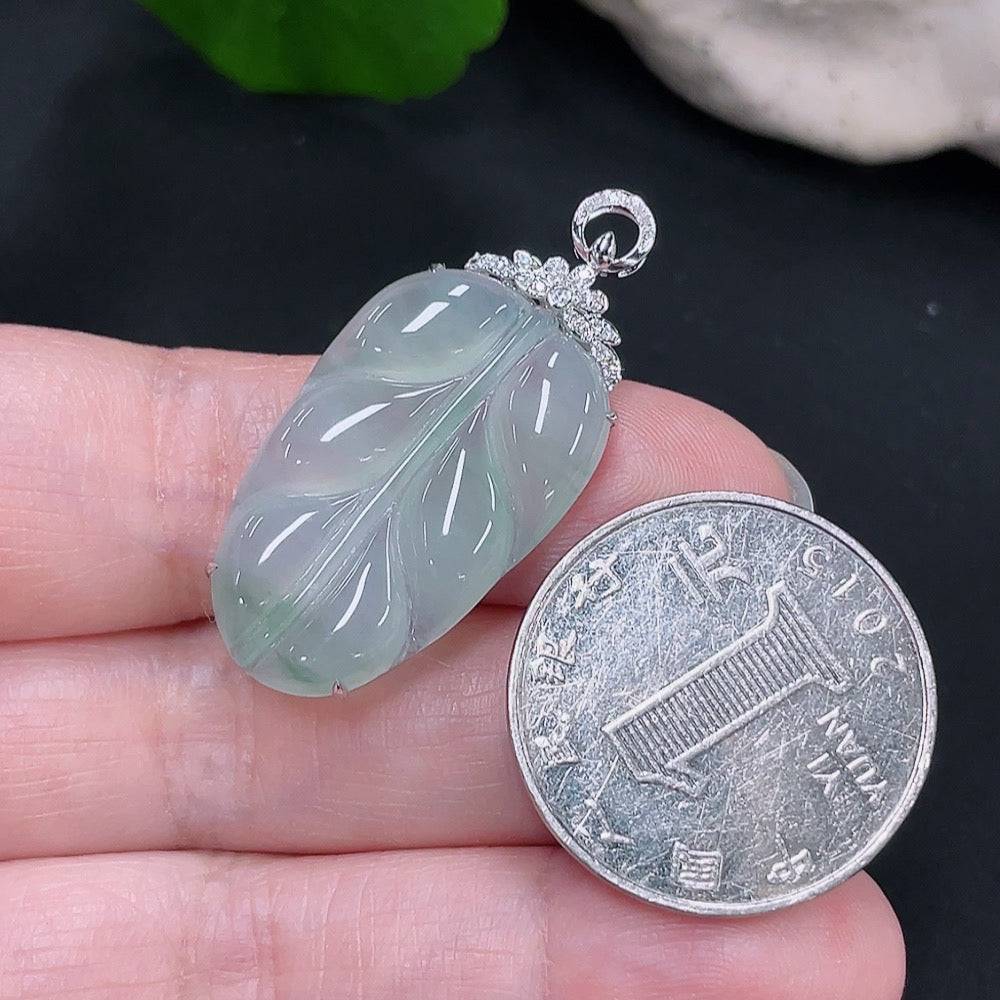 HUILIU HQ jadeite pendant in leaf shape with 18k gold and diamond accents, weighing approximately 4.34 grams.