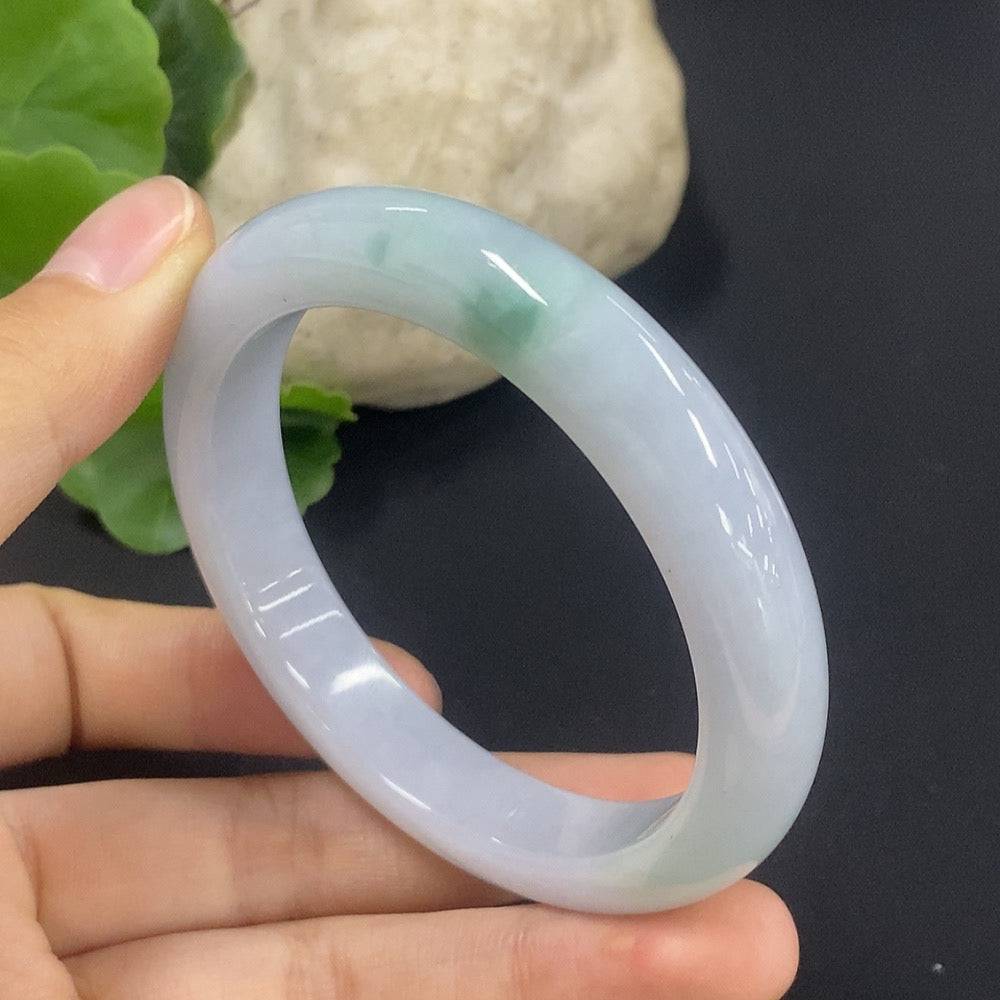 Huiliu Certified jadeite round bracelet with smooth, polished green jade beads, showcasing elegant craftsmanship.