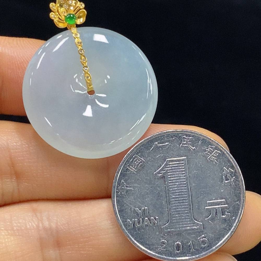 Huiliu Jadeite safety pendant with diamond accents, featuring polished green jade and silver chain, on a white background.