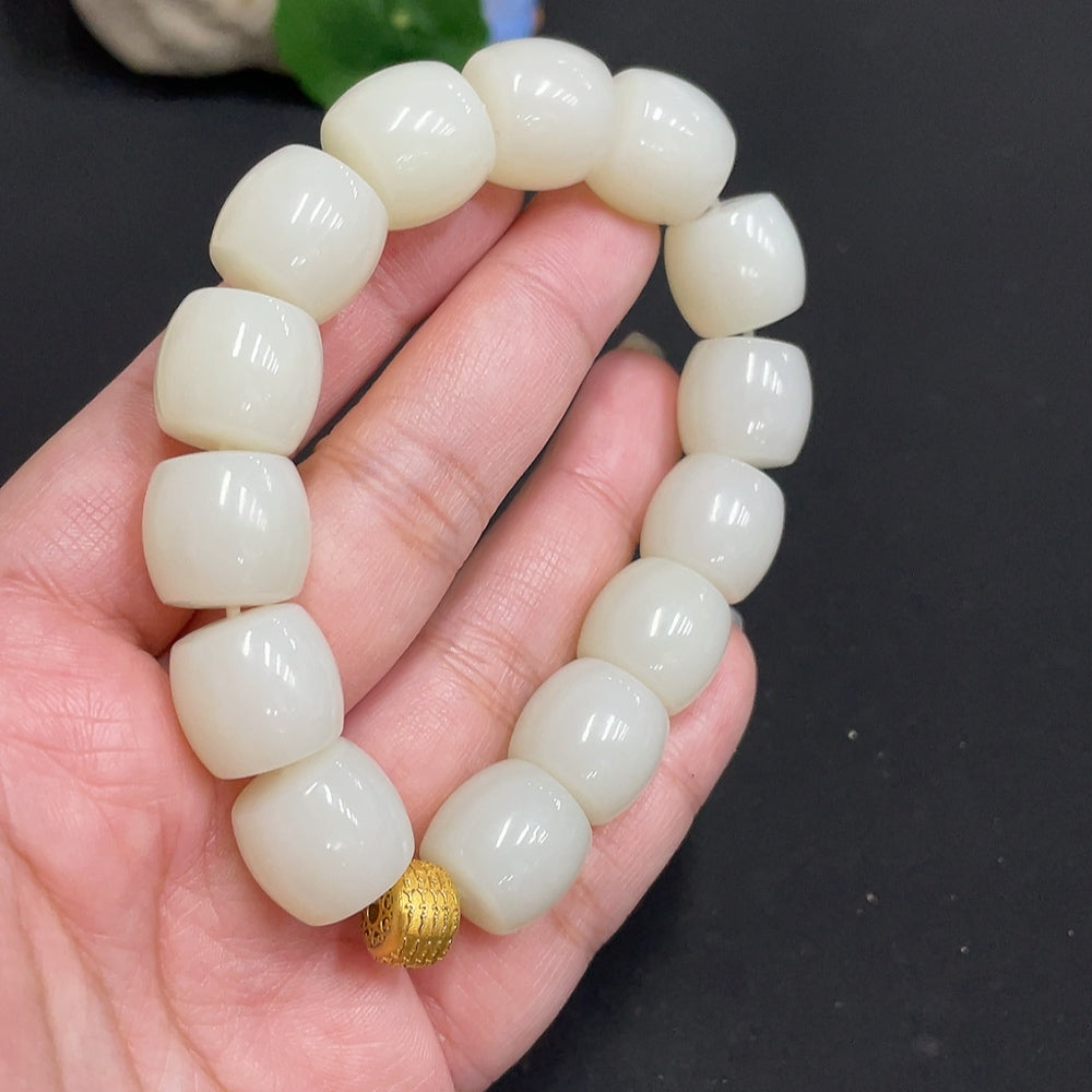 Hetian jade bracelet with 14.8mm beads, 18k gold accents, weighing 83g, tested for gold content, by HUILIU HQ.