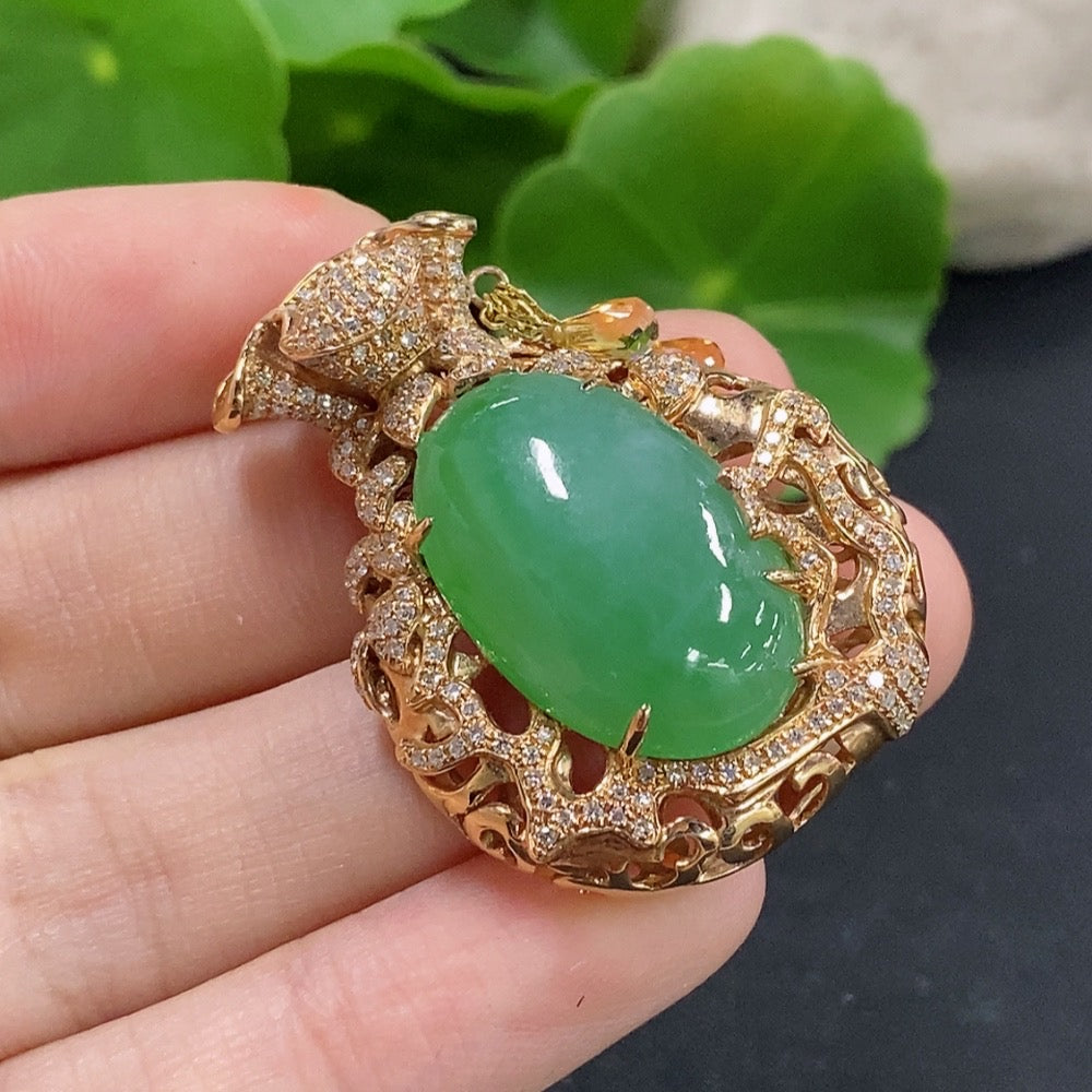 Jadeite pendant with 18K gold setting and diamond accents, elegant jewelry necklace with natural green gemstone and sparkling details.