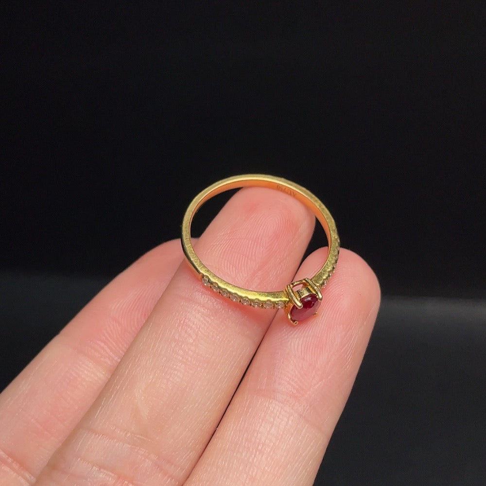 Huiliu Ruby ring with diamond accent, featuring vibrant red gemstone and sparkling diamond detail on a silver band.