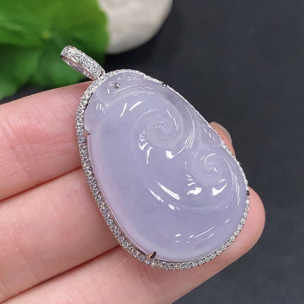 Huiliu Jadeite Ruyi pendant, non-diamond, crafted from green jade, featuring intricate traditional design on a cord.