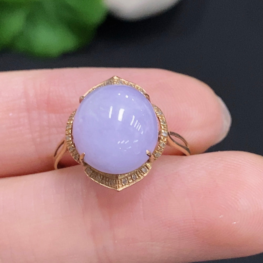 Huiliu Jadeite cabochon ring featuring a smooth, polished green jade stone set in a simple silver band.