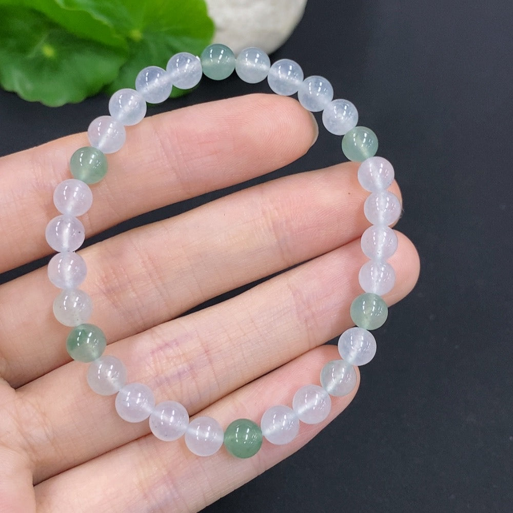 HUILIU HQ jadeite bracelet, approx. 11.4g, 5.9mm wide, featuring smooth green jade stones on a delicate jewelry bracelet