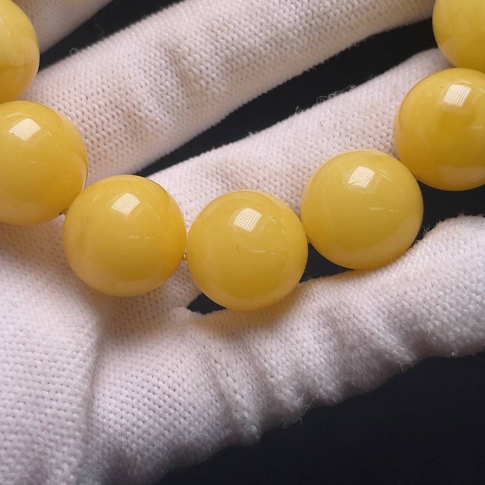 Huiliu Amber beeswax bead bracelet with 16.1mm beads, natural amber color, handcrafted jewelry, certified by Huiliu HQ.