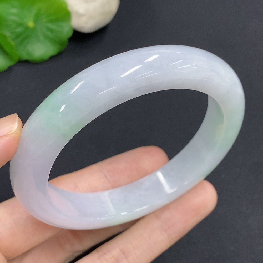 Jadeite round bangle with size 58.7 and weight 68.3g, showcasing smooth, polished green jade bracelet from HKHQ.