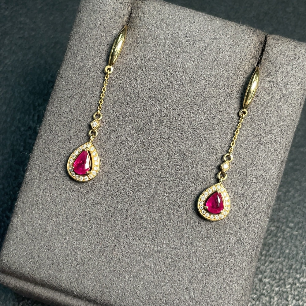 Ruby earrings with diamond accents, filled, gold content Au73%, total weight approximately 2.16g