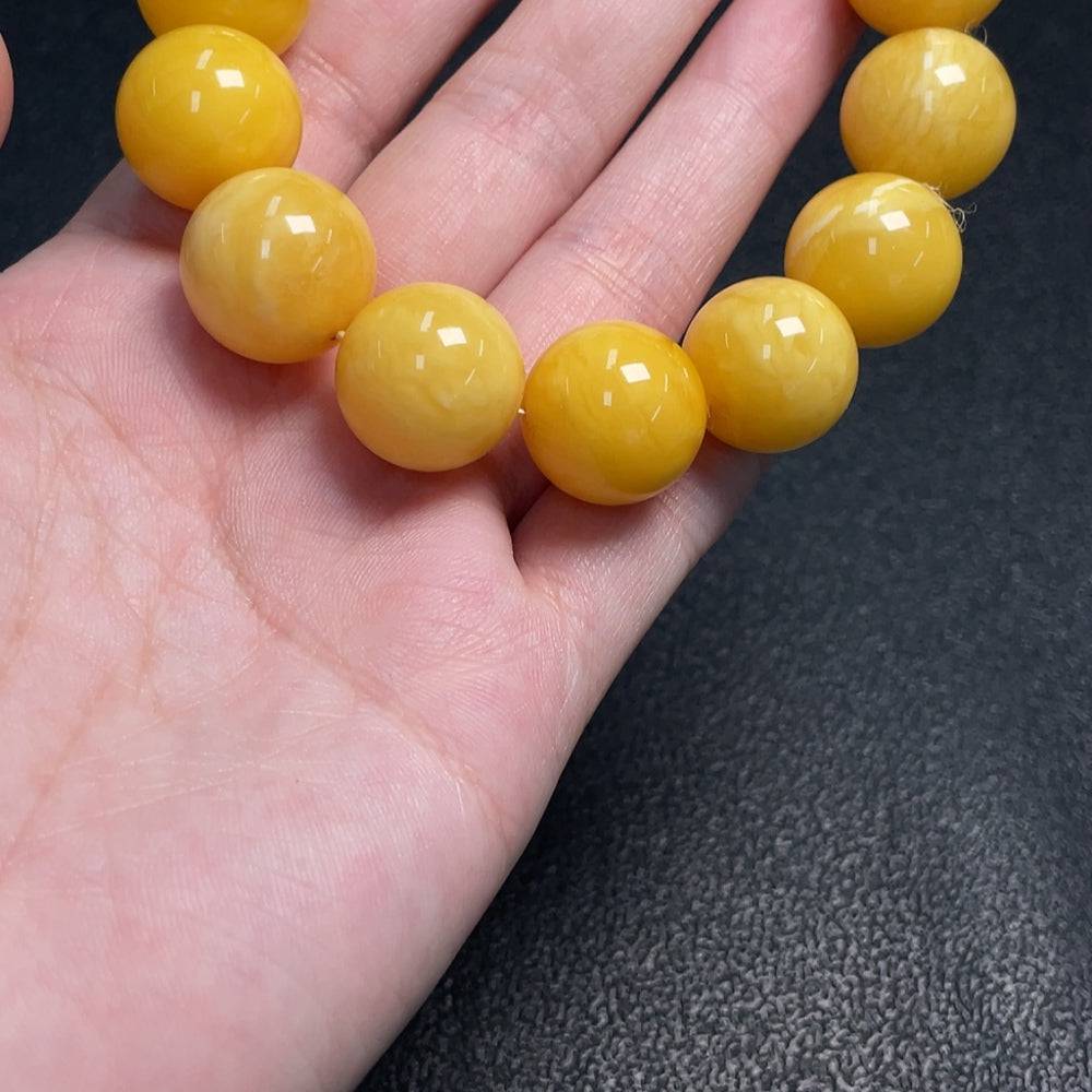 Huiliu Amber Beeswax Bracelet with 15.9mm amber beads, natural golden color, handcrafted jewelry featuring certified amber.