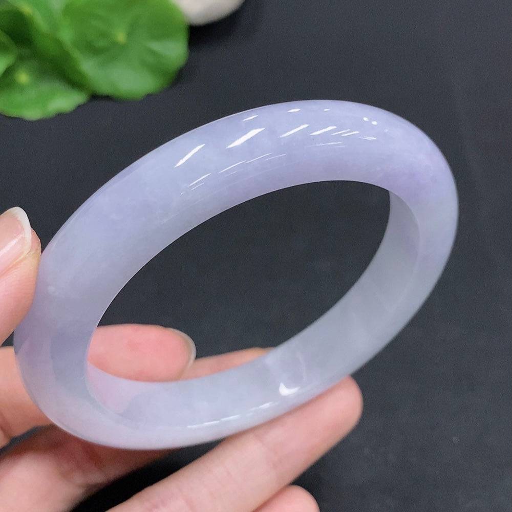 Jadeite round bracelet by HUILIU HQ, 61.5g, size 58, featuring polished green jade stones on a string.