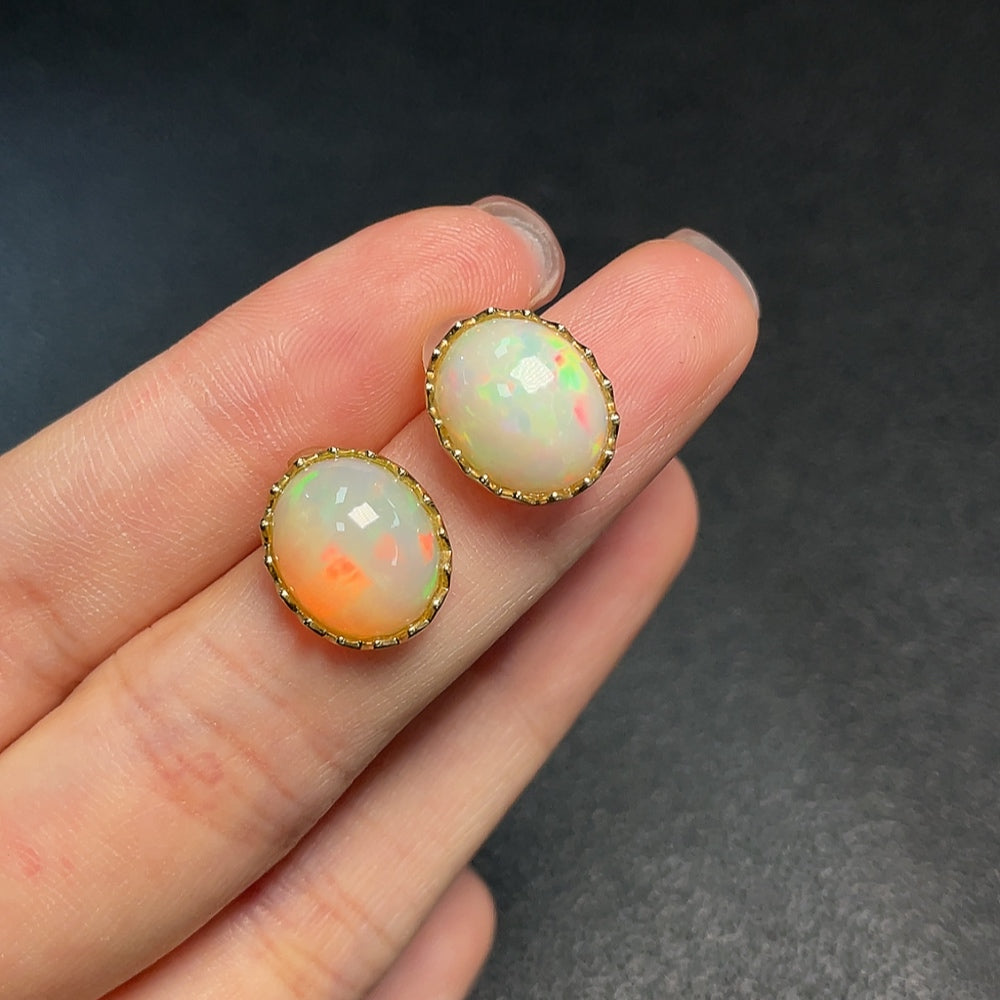 Huiliu Certified Opal Earrings with 37% content, featuring vibrant gemstones set in elegant jewelry.