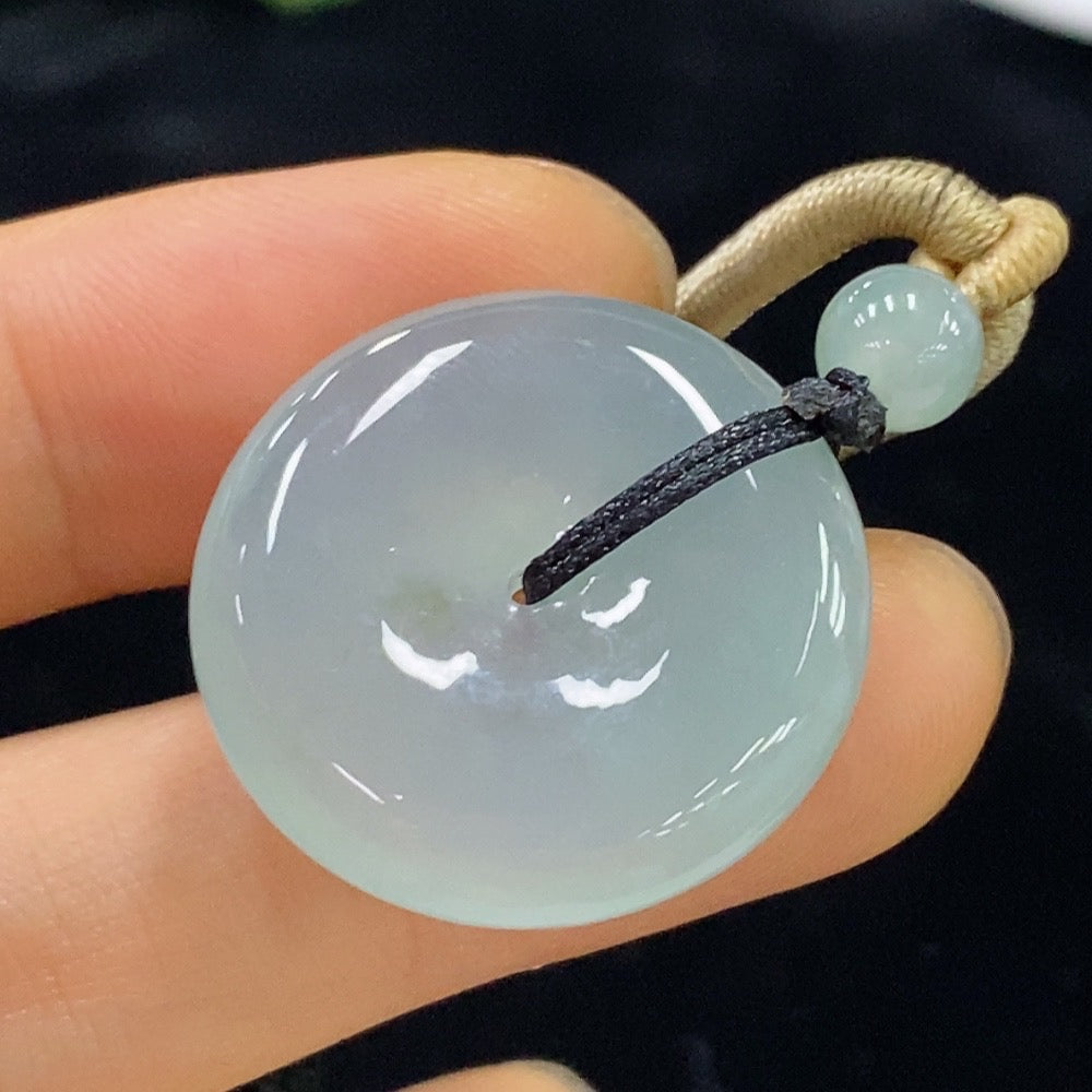 Huiliu Jadeite safety buckle pendant with rope weight, featuring polished jadeite stone and secure clasp, certified by HUILIU HQ.
