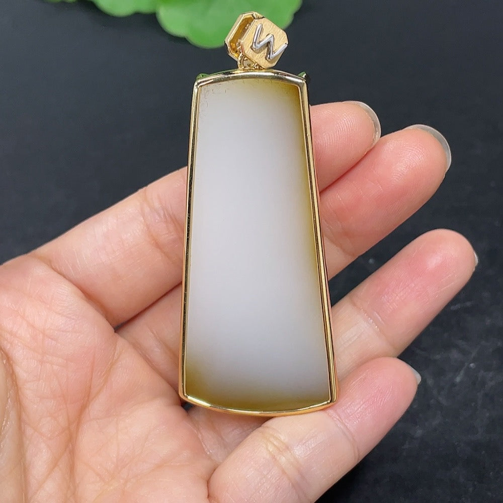 Hetian jade pendant with 18k gold inlay, plain design, showcasing smooth jade surface and gold accents, weighs approx. 36.8g.