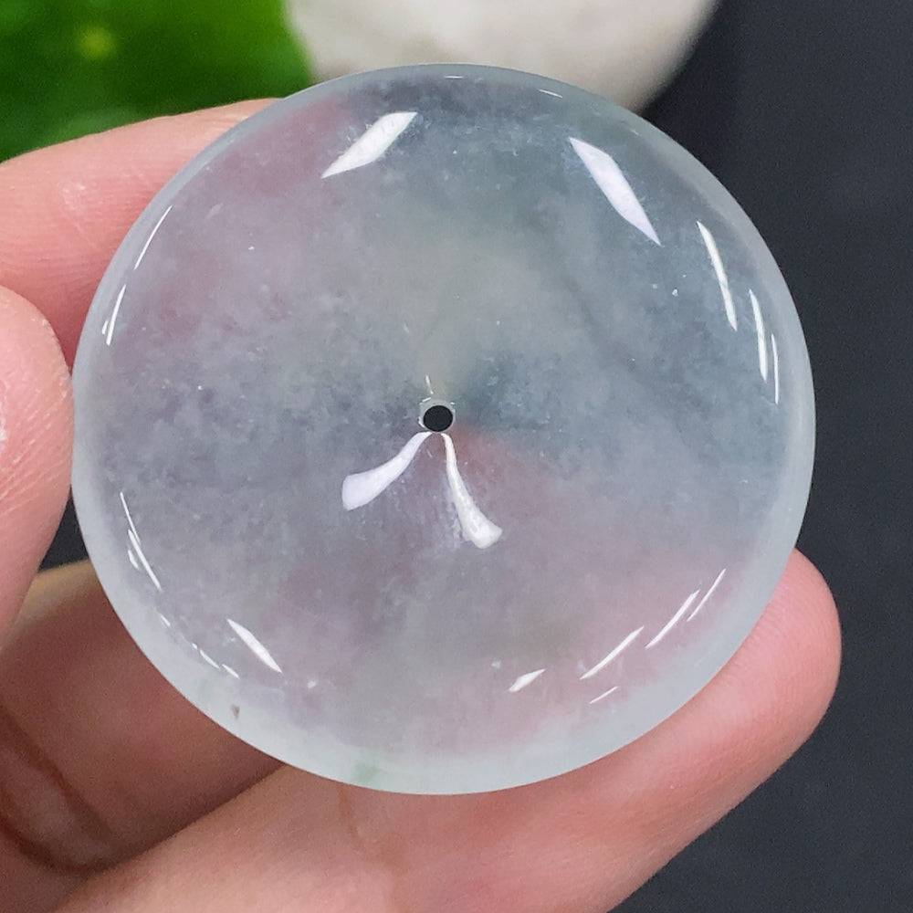 JadeitePeace decorative button made of jade, featuring a peaceful design, from HUILIU HQ, close-up view of the polished jade surface.