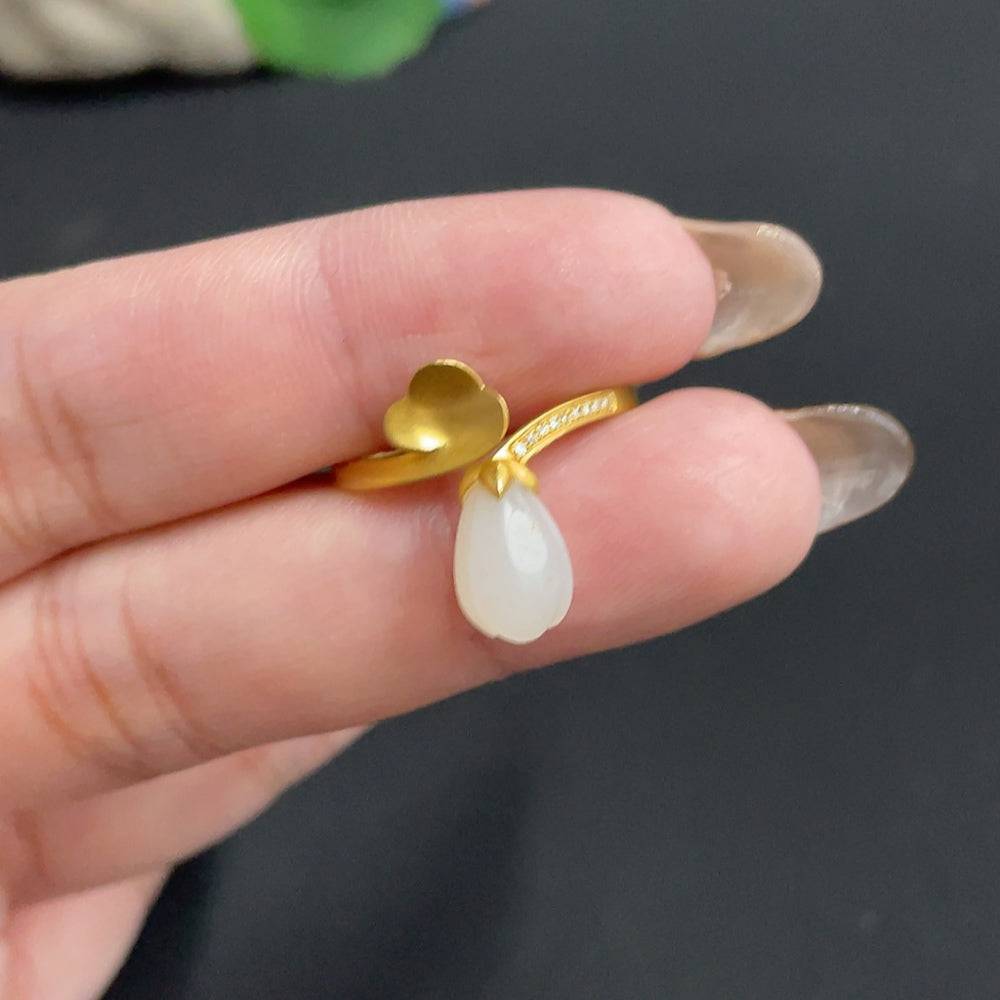 Huiliu Hetian Jade Magnolia Inlay Ring with diamond accents, crafted from jade, featuring intricate design and certified quality.
