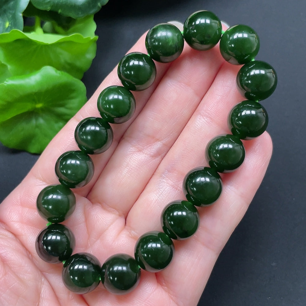 HKHQ Hetian Jade bracelet with 11.9mm beads, weighing approximately 45.24g, showcasing smooth, polished jade stones.