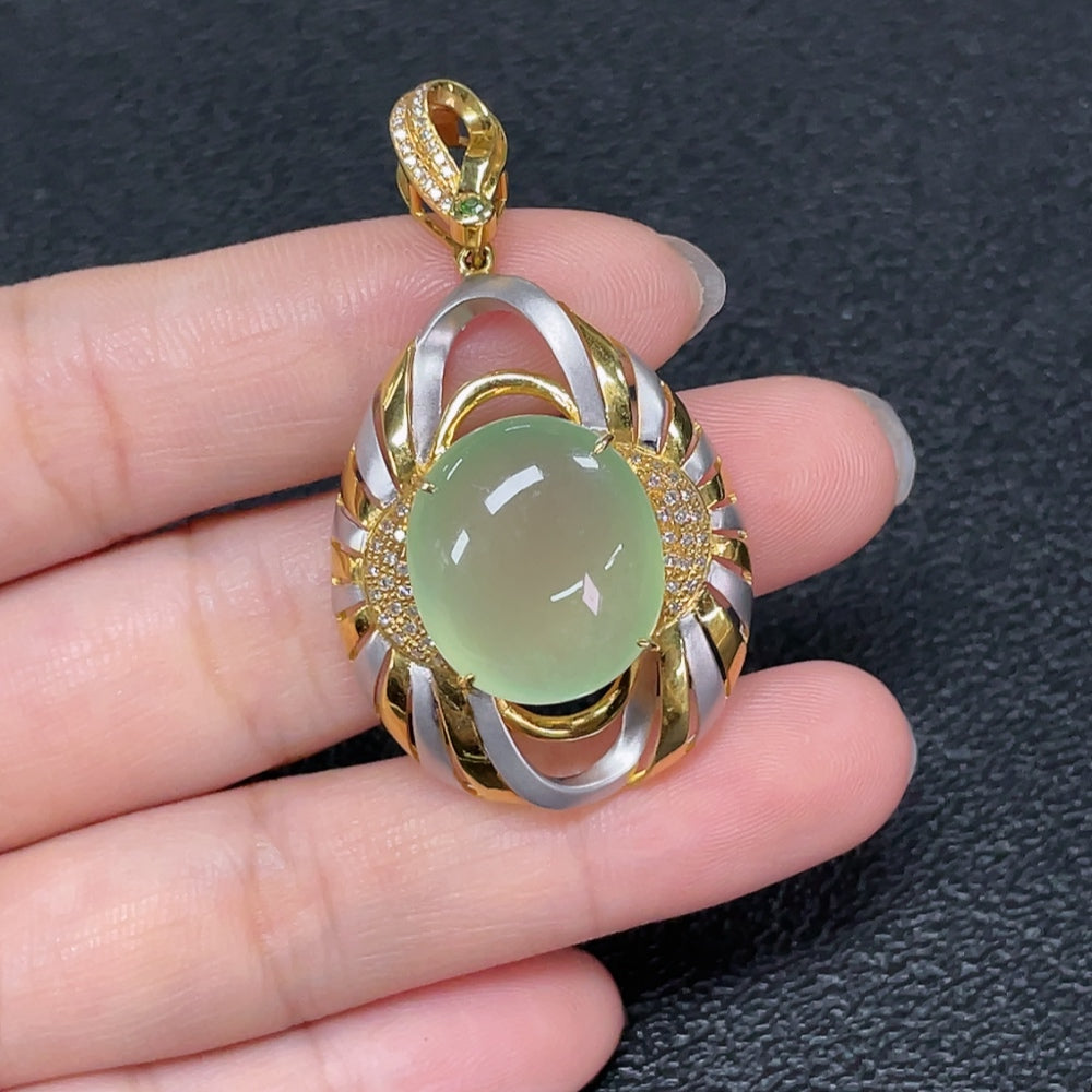 Prehnite pendant with diamond accents set in 18K gold, elegant necklace jewelry featuring a polished green gemstone.