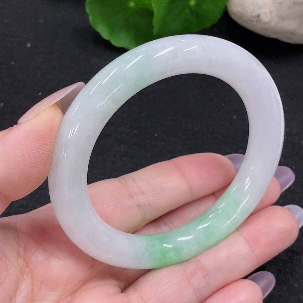 HUILIU HQ jadeite round bangle in size 54, crafted from green jade, weighs approximately 57.4 grams, smooth and polished finish.